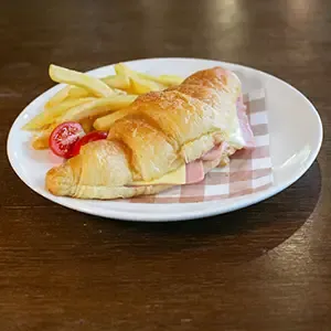 Ham & Cheese Croissant sandwich by cafe de thaan aoan
