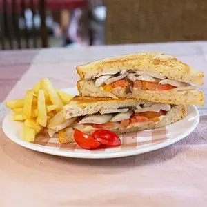 Grilled vegetables sandwich served with fries by cafe de thaan aoan