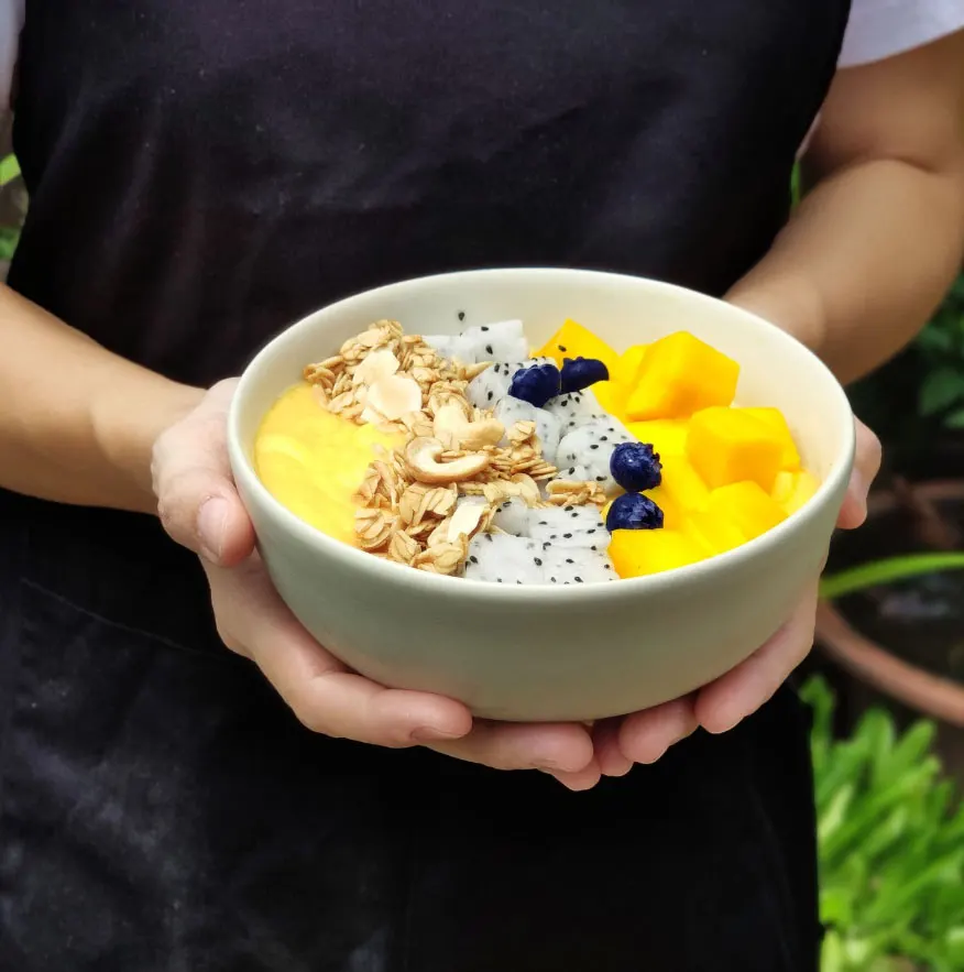 mango smoothie bowl – best breakfast in chiang mai mango smoothie bowl - best breakfast in chiang mai at Thaan Aoan.