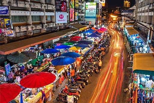 Street food stalls near Warorot Market in Chiang Mai at night